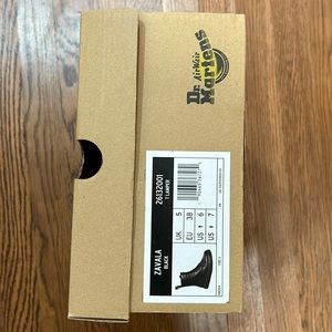 Doc Martens high top boots.